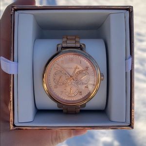 Michael Kors rose gold women’s watch
